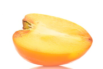 Ripe juicy organic persimmon, close-up, on a white background.