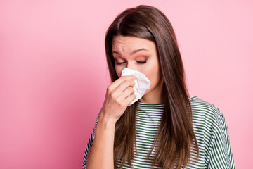 Portrait of sick young brunette lady hold napkin feel ill dress shirt isolated on pastel pink color background