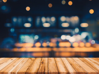 wooden table in front of abstract blurred restaurant lights background