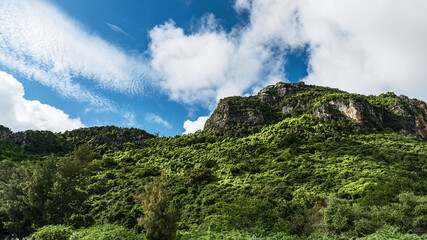 Mountains, cliffs and blue skies in the rainy season of Thailand.