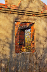 Sunny day. Abandoned building window