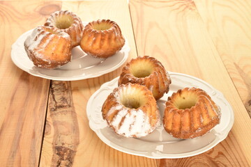 Fragrant sweet cupcakes, close-up, on a  background.
