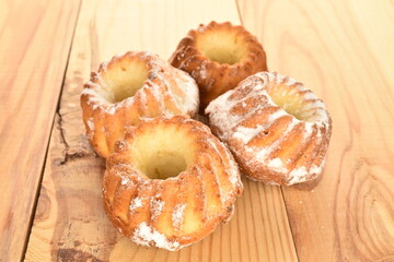 Fragrant sweet cupcakes, close-up, on a  background.