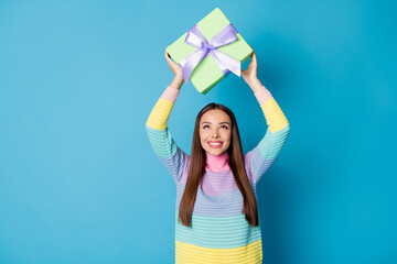 Naklejka na ściany i meble Photo of pretty girl hold gift box get 14-february 8-march holiday wear pullover isolated blue color background