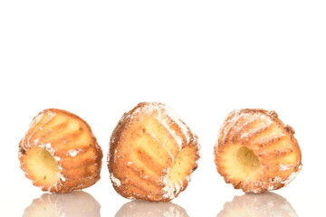 Fragrant sweet cupcakes, close-up, on a white background.