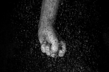 human hands with droplets 