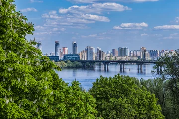 Foto op Canvas View of Dnieper River with Paton Bridge and architecture of Left Bank of Dnieper in Kyiv. Kyiv, Ukraine. © dbrnjhrj