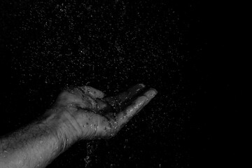 human hands with droplets 