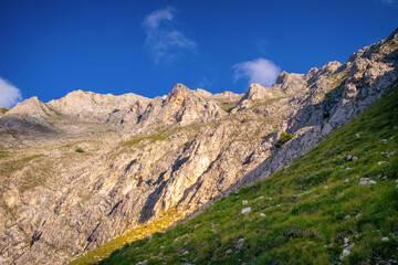 Hiking to Koncheto, view across the peaks of the Pirin Mountains in Bulgaria with Vihren, Kutelo,Todorka,Banski Suhodol , National Park Pirin with company of wild goats