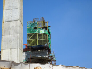 SHAH ALAM, MALAYSIA -AUGUST 6, 2020: Temporary staircase and scaffolding are used in the...