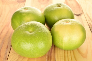 Ripe juicy sweets, close-up, on a wooden table.