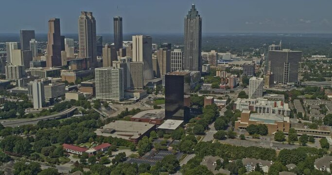 Atlanta Georgia Aerial v709 pan left shot of park, skyscrapers and freeway in O4W area - DJI Inspire 2, X7, 6k - August 2020