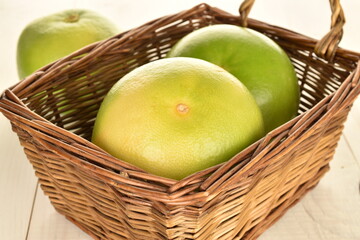 Ripe juicy sweets, close-up, on a white wooden table.