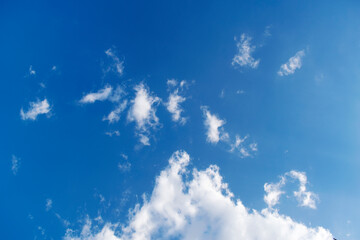 Fototapeta na wymiar blue sky background with white clouds