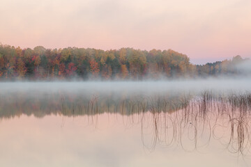 Autumn landscape at dawn of Moccasin Lake in fog, Hiawatha National Forest, Michigan's Upper Peninsula, USA