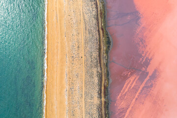 Pink lake on the Crimean Peninsula taken during the day from a quadrocopter