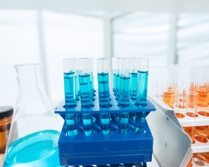container with test tubes on the table in the laboratory.