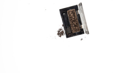 Smashed eye shadow make up palette isolated on white background. Eyeshadow crushed palette, makeup cosmetics