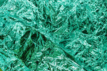 shiny green crumpled foil grunge texture