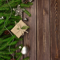 Christmas border on dark wooden background with copy space