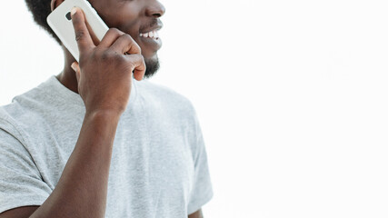 handsome guy with smartphone looking at copy space.