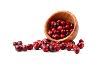 Cranberries in wooden bowl isolated on white background