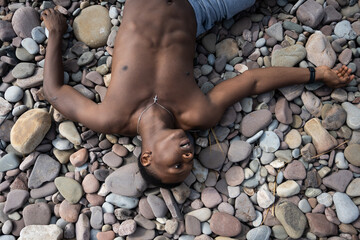 Man Lying on the Beach 