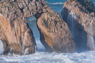 Swell in the Cantabrian Sea. Big waves in the so-called "Puerta del Cantabrico" on the cliffs of Liencres. Municipality of Piélagos in the Autonomous Community of Cantabria, Spain, Europe