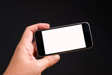 Hand with Smartphone and Empty Space