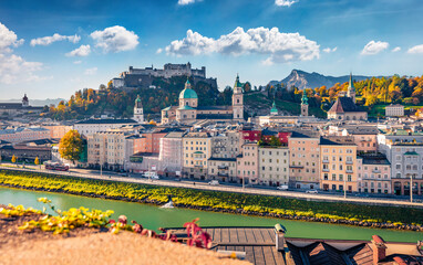 Fototapeta premium Captivating cityscape of Salzburg, Old City, birthplace of famed composer Mozart. Impressive autumn scene of Eastern Alps. Wonderful morning landscape with Salzach river. 