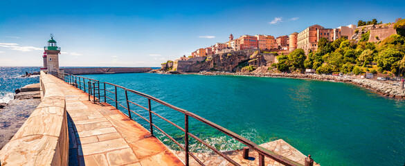 Panoramic spring cityscape of Bastia port. Attractive morning view of Corsica island, France, Europe. Captivating Mediterranean seascape with yacht and lighthouse. Traveling concept background.
