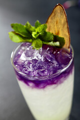 Modern cocktail with pear and ube  sweet potato