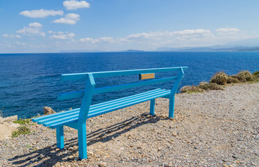 Naklejka na ściany i meble A bench at the coast