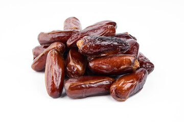 Creative layout made of dried dates. Flat lay. Food concept. Fruits dates. Dates Palm fruit isolated on white. Dried fruits. Healthy diet.