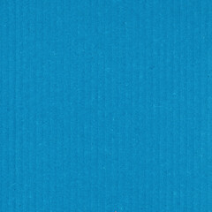 A blue vintage rough sheet of carton. Recycled environmentally friendly cardboard paper texture. Simple minimalist papercraft background.