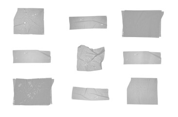 Set of various adhesive tape pieces isolated on white background. Strips of masking tape. Paper tape texture.