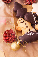 Gingerbread man and gingerbread cookie on bokeh background. Christmas banner.