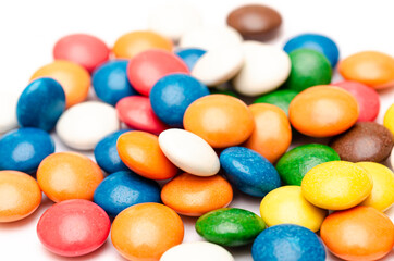 Fototapeta na wymiar Lots of colorful delicious chocolates, closeup