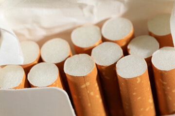 Box with cigarettes with filter