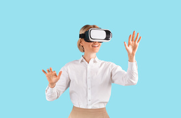 Business lady in VR headset touching virtual screen on blue studio background
