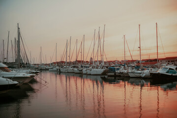 Fototapeta na wymiar There are many yachts, boats and ships at sea. Marina at sunset. Vosice Croatia Gorgeous summer sunset by the ocean