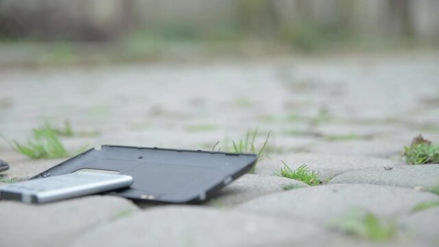 Smartphones cellphone phone drop to the ground. Make the screen broken and damaged. accident insurance technology, repair and maintenance.