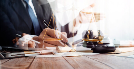 Fototapeta na wymiar Business and lawyers discussing contract papers with brass scale on desk in office. Law, legal services, advice, justice and law concept picture with film grain effect