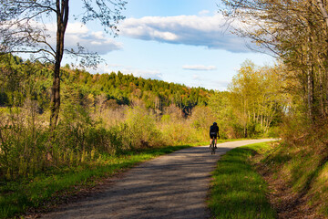 Obraz na płótnie Canvas Biker on Bike path in Cambridge, Vermont