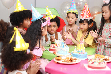 Happy birthday party event, group of adorable kids celebrate birthday party together, happy children have fun together