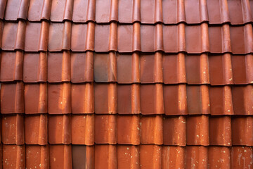 Clay tiles are installed for the roof of the house, in an extreme way.