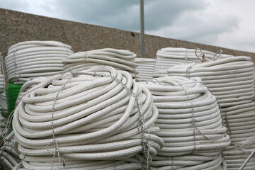 Large ropes curled up - 389711750