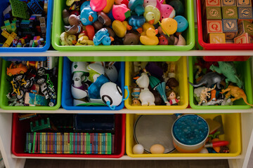toy storage bins overflowing with toys