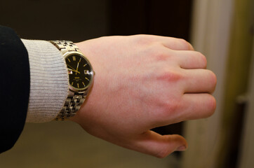 Businessman looking at the time