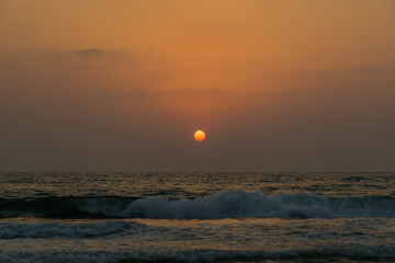 Beautiful sunset at Baga beach in Goa, India